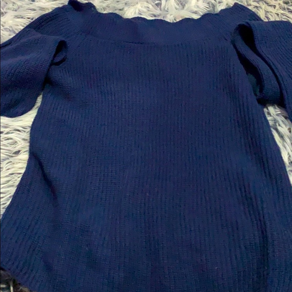 A blue off the shoulder sweater!